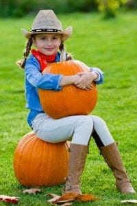 Pick out a pumpkin for decorating at a local pumpkin patch with your kids.